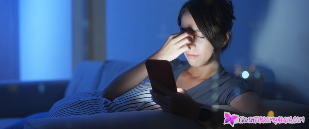 Woman suffering with eye strain caused by fibromyalgia